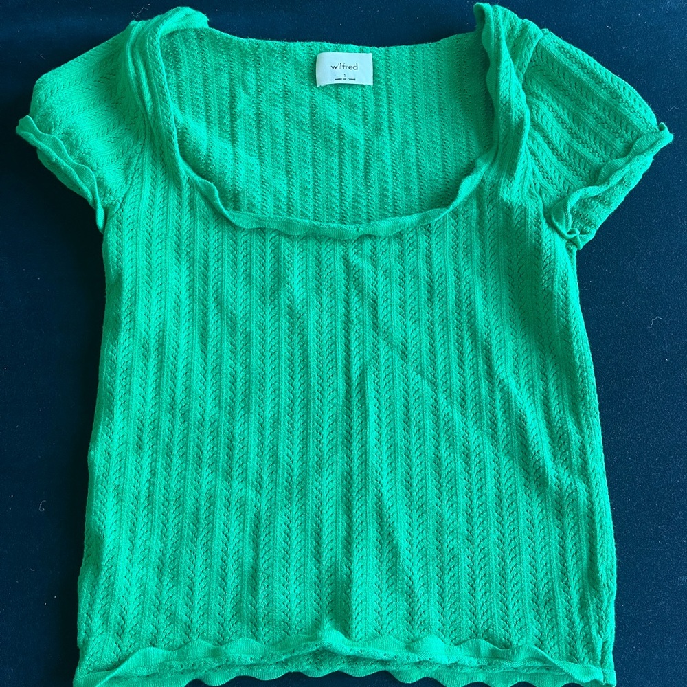Green knit top with scalloped edges, size small